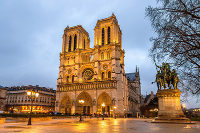view of notre dame in the evening